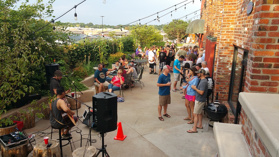 People in Outside Event Space Enjoying Musical Entertainment